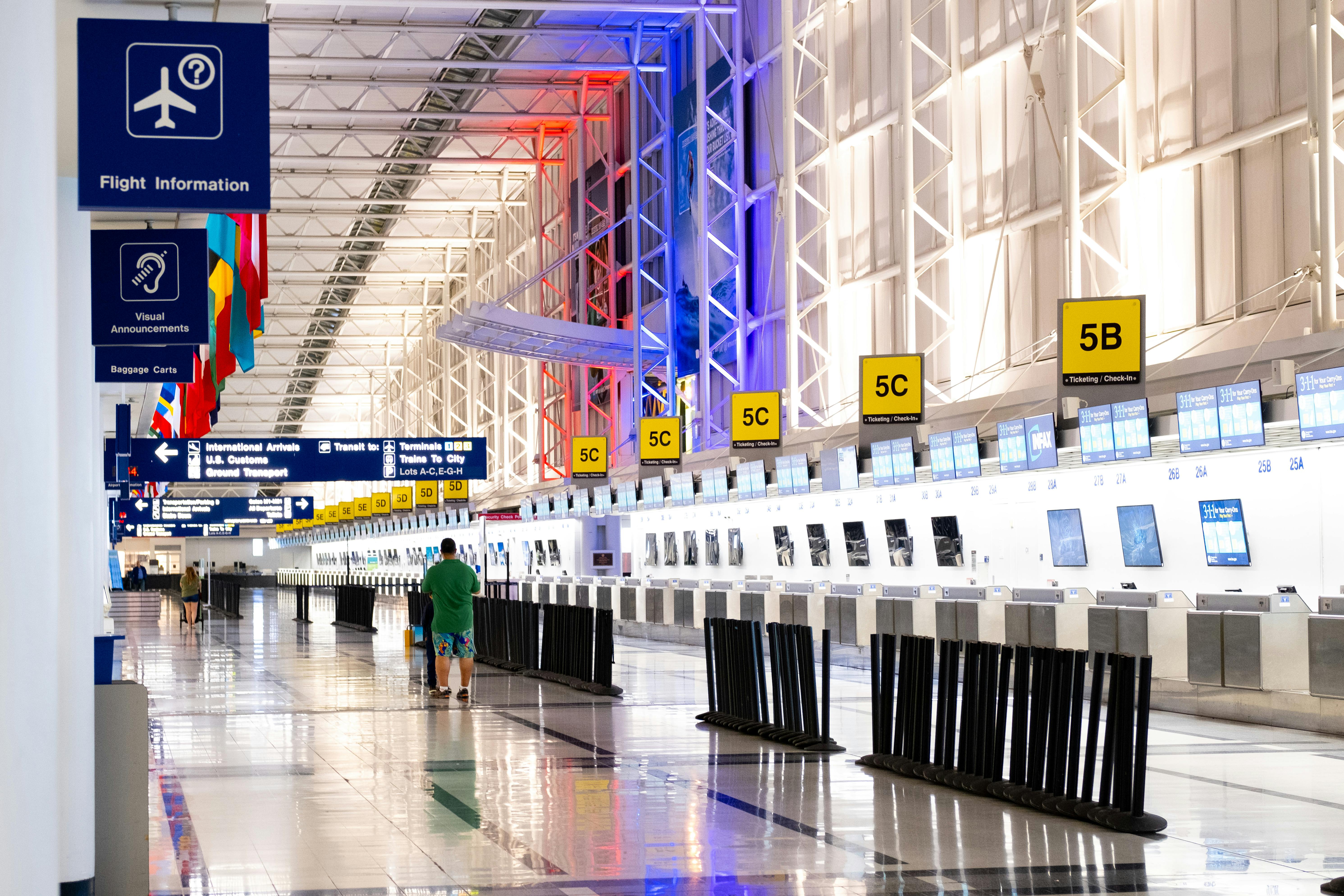 Airport check-in counters and signage