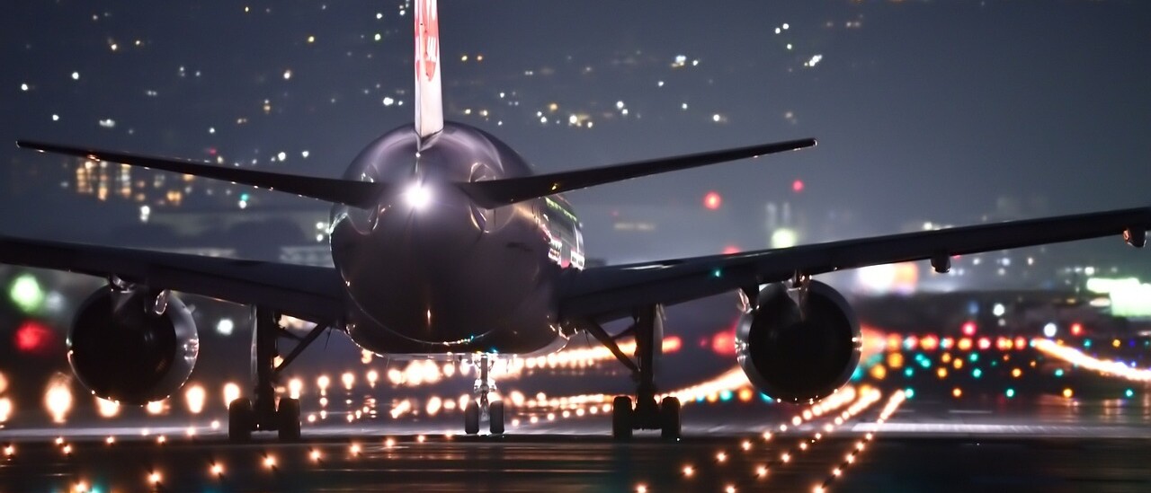 Aircraft on a lighted airport runway